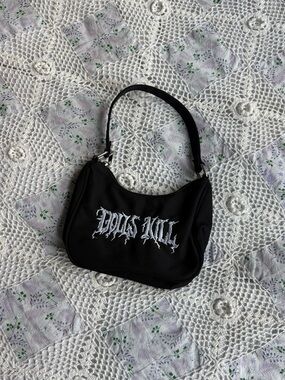 Dolls Kill Black mini nylon shoulder bag with white text embroidery